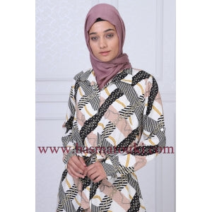 la robe boutonnée devant beige et vert